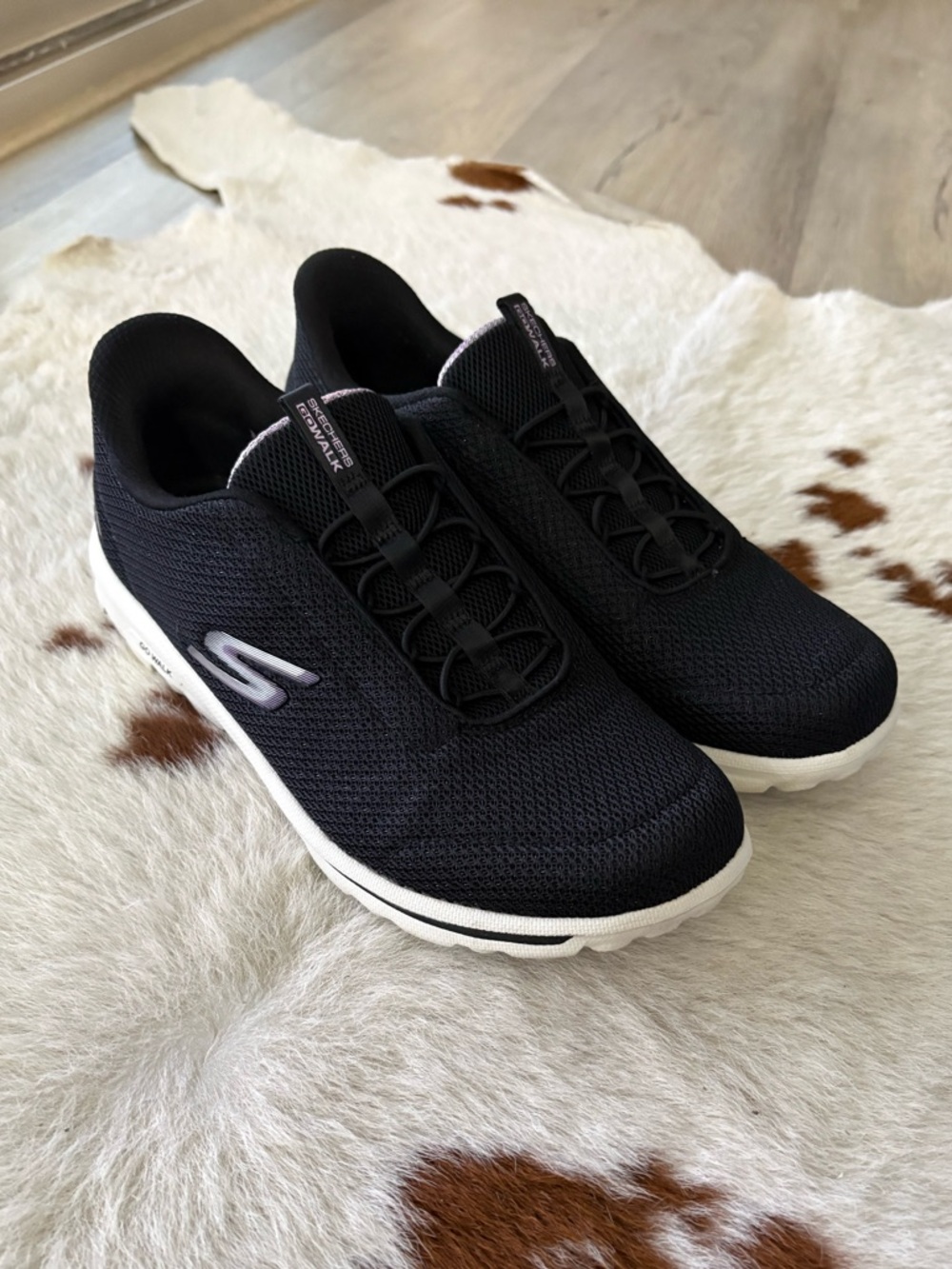 NIB. Skechers Black Knit Slip-On GOwalk Sneakers with White Sole